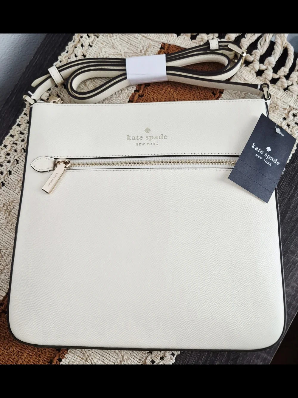 Kate Spade Sadie Cream Saffiano Leather crossbody with front zip